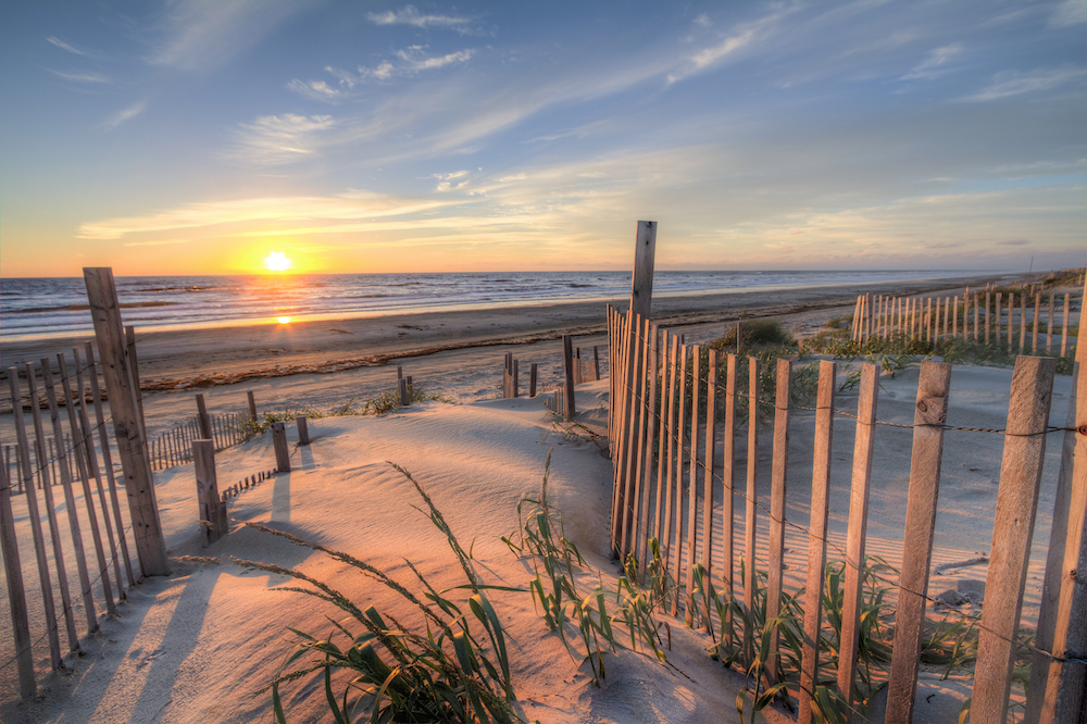Sunrise as seen from the sand dunes at the Outer Banks, NC around Corolla.