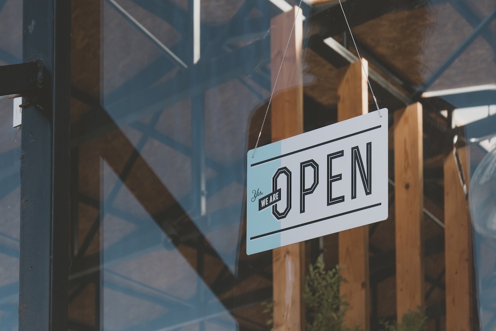 CU we are open sign hanging on the entrance door of a small cafe. Small business concept SSUCv3H4sIAAAAAAAAE22NOw7DMAiG78LsobOvEmUgDk0sIVsCPFSW716oMnb7+F9MOFBrgTyBzmpdKjLkV4LKPNQErfbmwkpQ0OjyAGmk8aJWPk7uPBPbjAxkgAQ6joCV/mi7V7rdJLEj1M6gN7KSG0JMqPFj271iaON3zbW+/Ph+vKwAAAA=